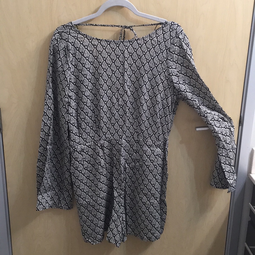 Romper, black and white pattern, size large.